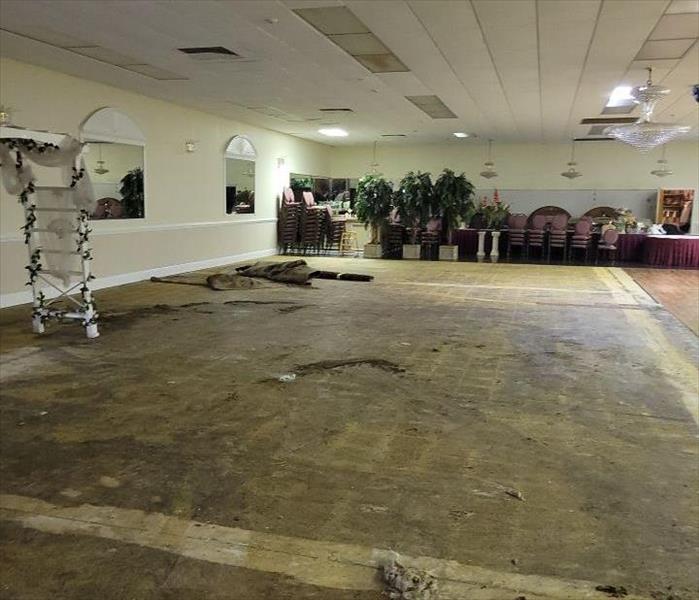 Water Damage to floor in banquet hall