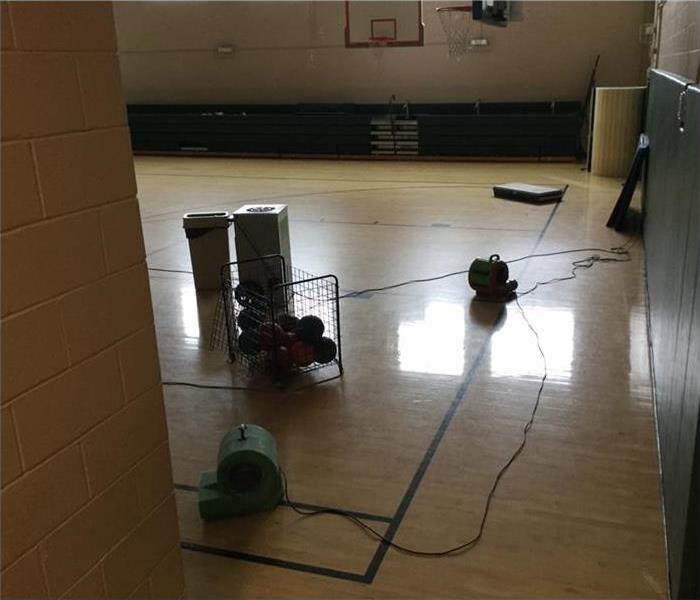 Drying equipment placed on basketball court